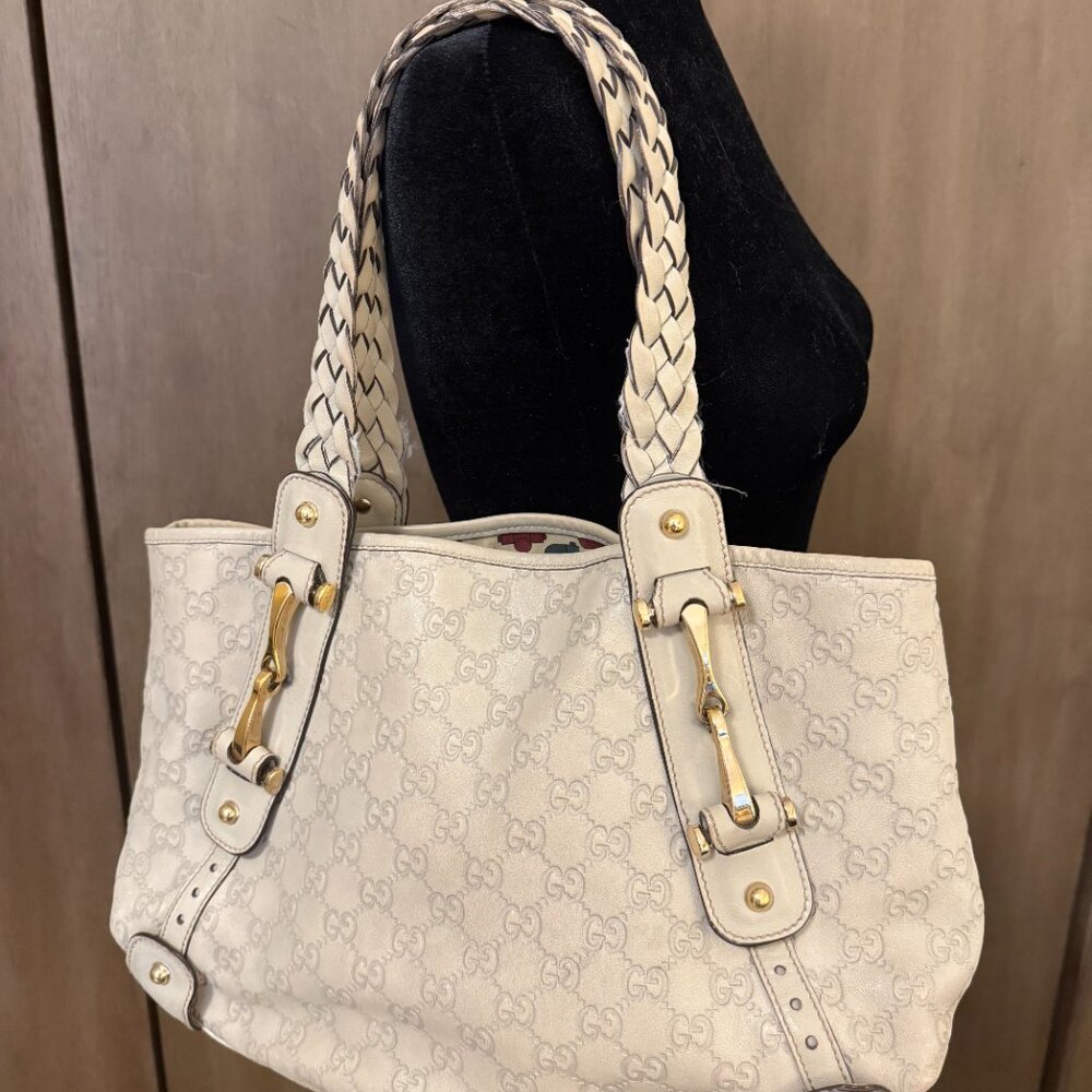 GUCCI Pelham Guccissima with braided straps